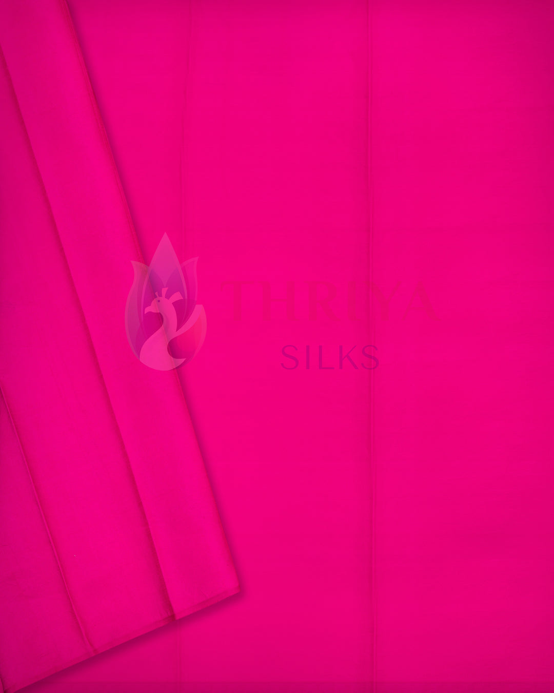 Bright pink plain Kanchipuram silk saree with subtle texture