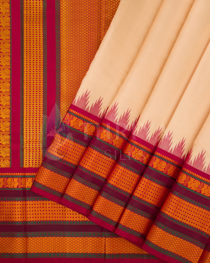 Cream silk saree pleats with intricate pink, orange, and gold border design, from Thriya Silks