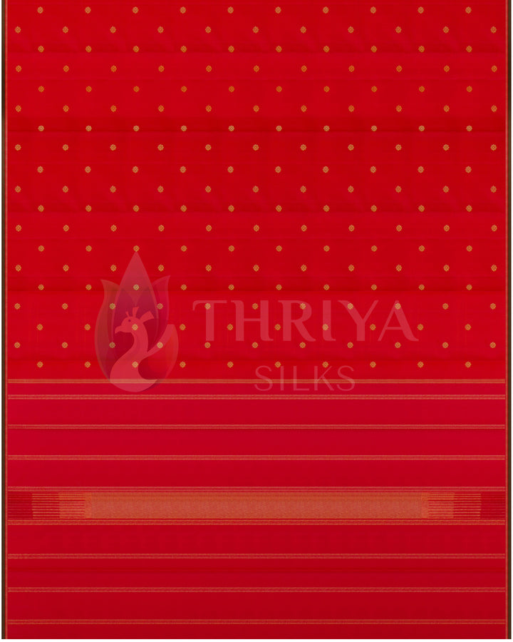 Top view of full red Kanjivaram silk saree with small gold zari buttas and rich striped pallu – Thriya Silks
