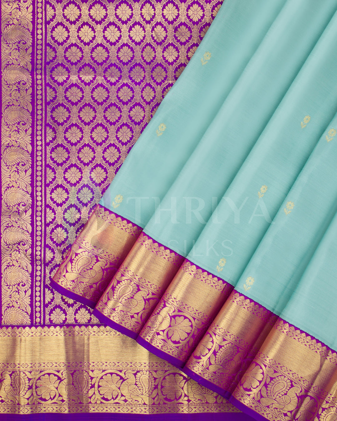 Thriya Kanchipuram silk saree in light blue with rich purple and gold zari border