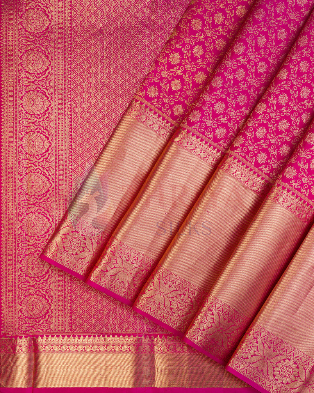 Rani pink Kanjivaram silk saree with copper zari floral jaal and traditional motifs