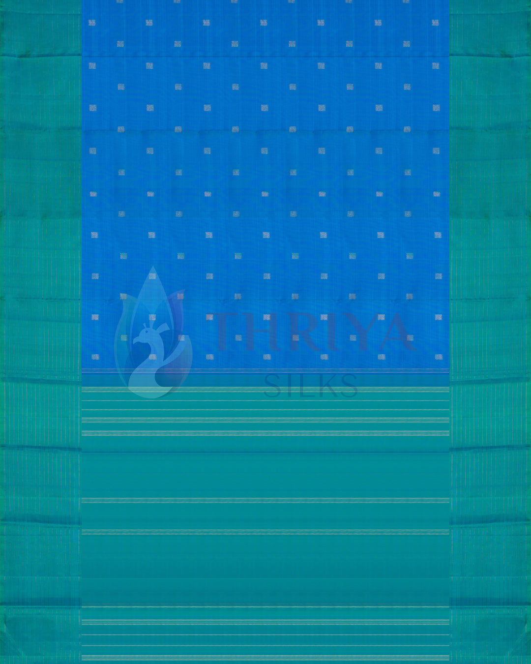 Full view of blue silk saree with green border and golden zari polka dot motifs
