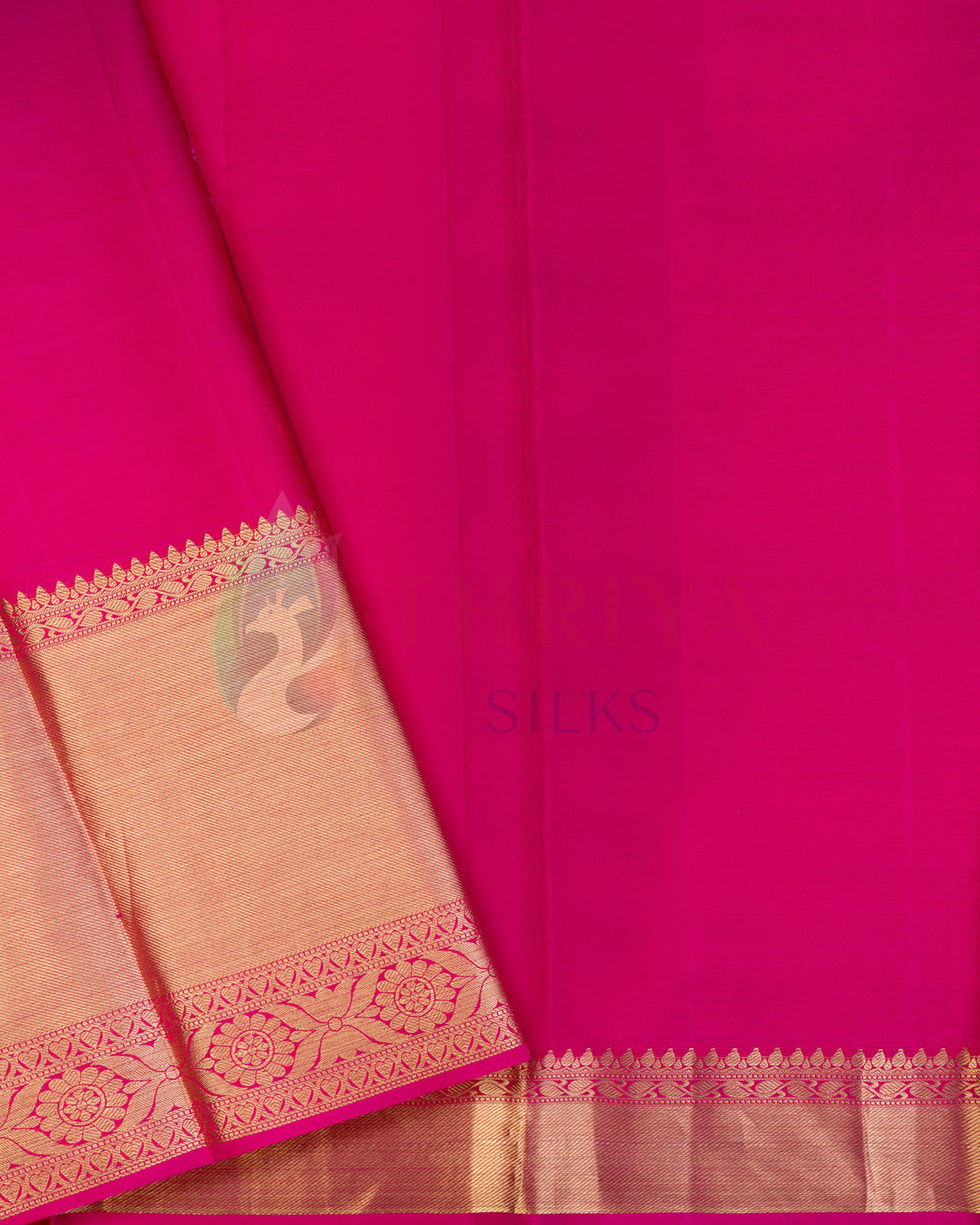 Plain rani pink blouse with copper zari border – Kanjivaram bridal saree