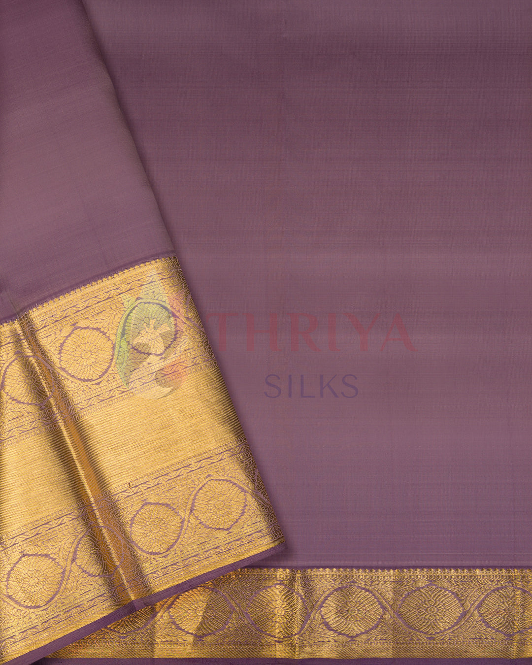 Plain purple silk blouse with golden zari border – matching Kanjivaram saree