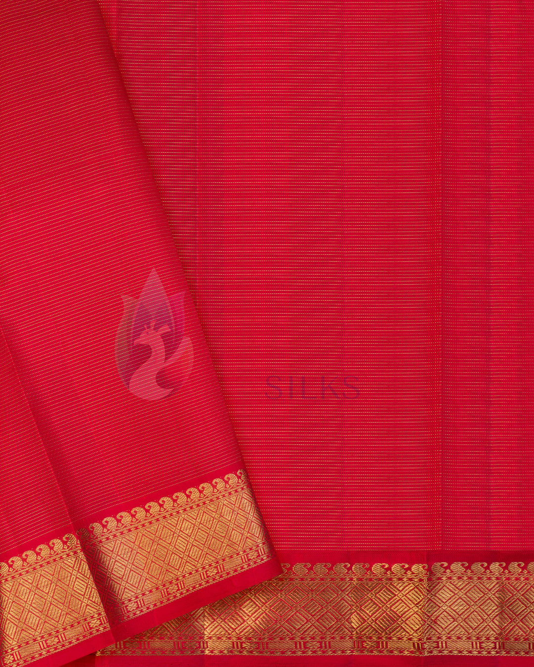 Close-up of red zari floral border on royal blue Kanjivaram silk saree