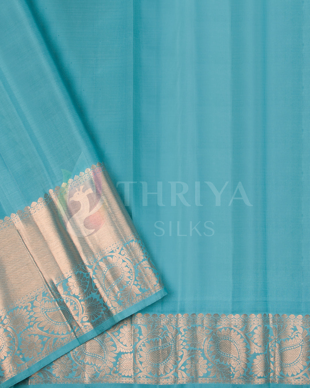 Plain aqua blue blouse piece with silver zari border for contrast.
