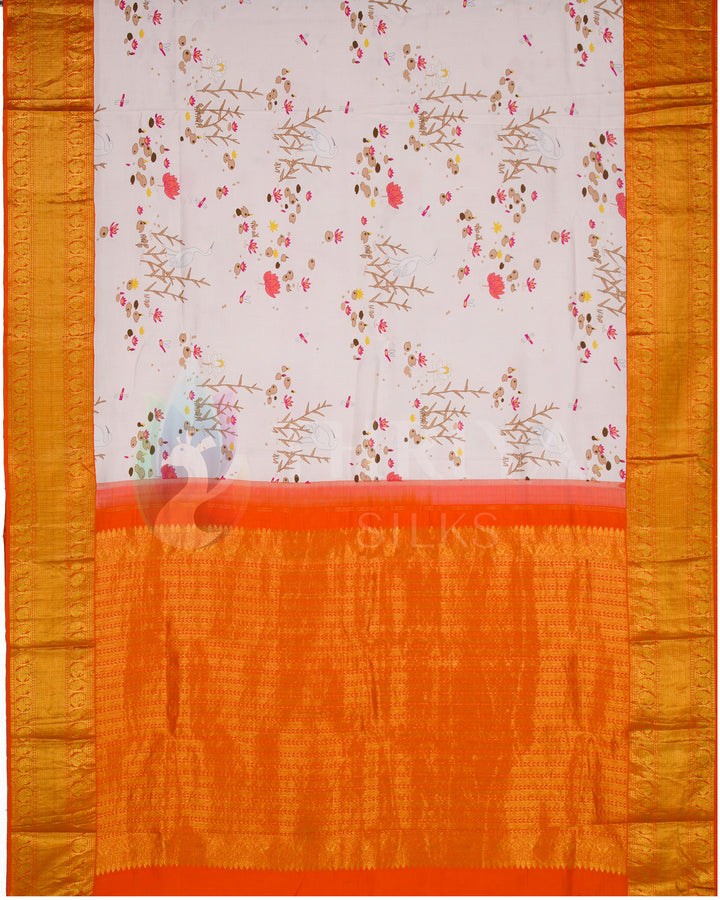Full pallu view of the pink silk saree adorned with small floral motifs and a detailed orange zari pallu.