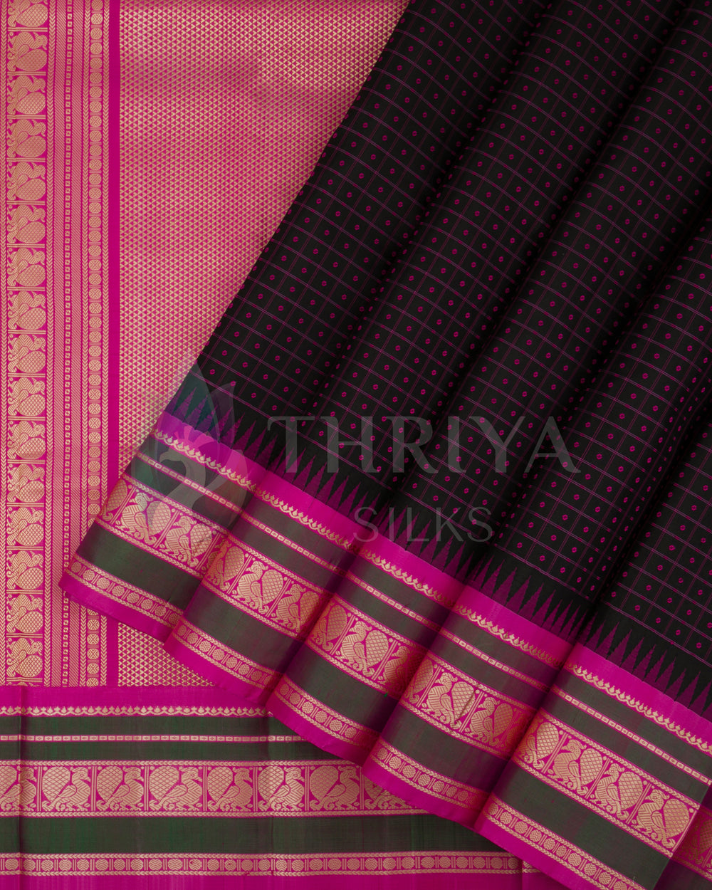 Close-up view of black and pink Kanjivaram silk saree pallu with gold zari detailing and traditional border design