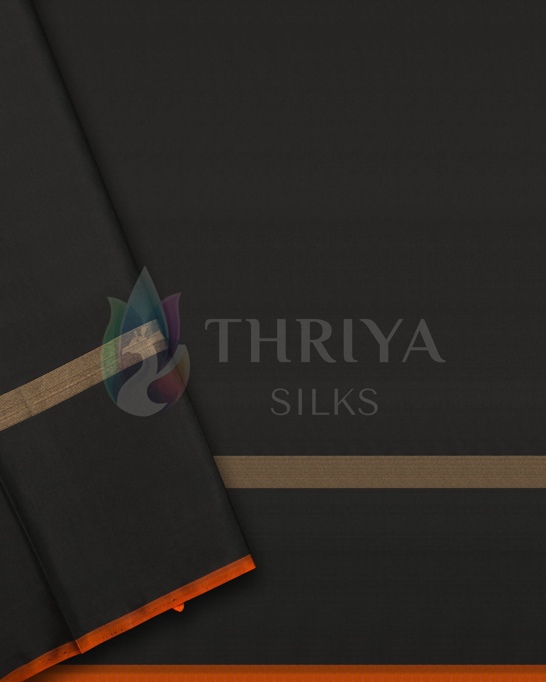 Black blouse piece with gold zari lines and orange piping from the temple border silk saree