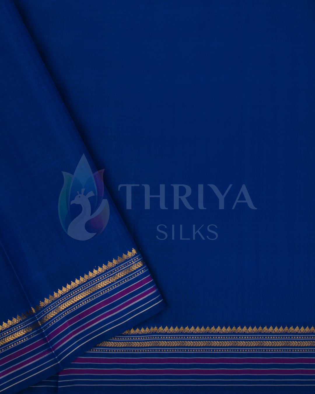 Plain blue silk blouse piece matching the saree, from Thriya Silks