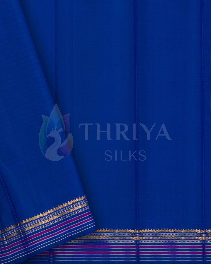 Blue silk blouse piece matching the yellow-green saree, from Thriya Silks