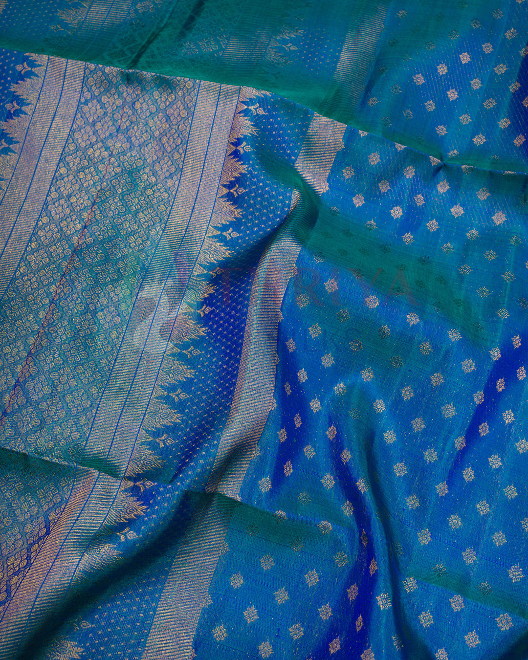 Blue Kanchipuram silk dupatta featuring zari border and soft green fringe tassels