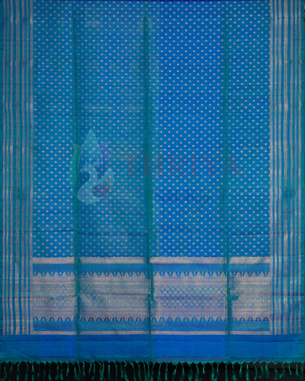 Traditional blue silk dupatta with woven gold zari and elegant fringe finish