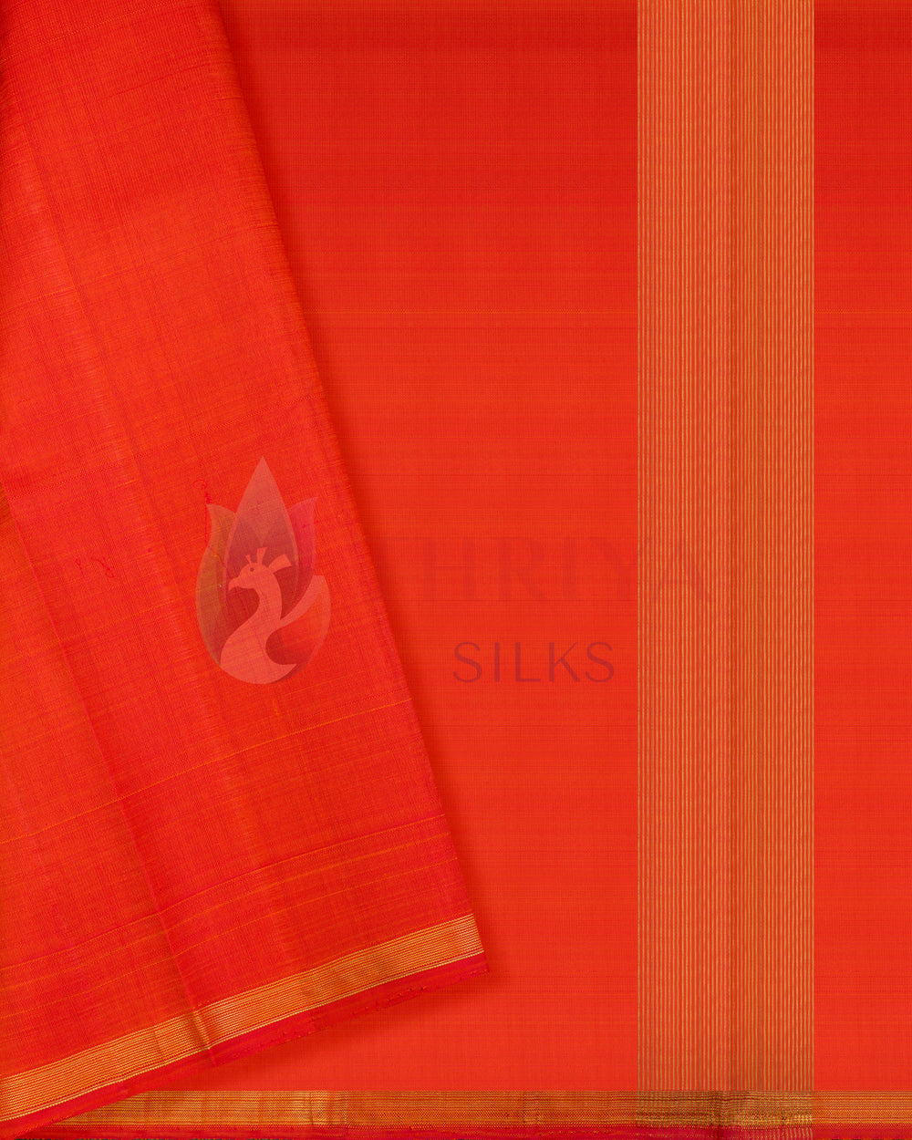 Kanchipuram silk saree with contrast body and pallu in red featuring gold zari border and intricate detailing