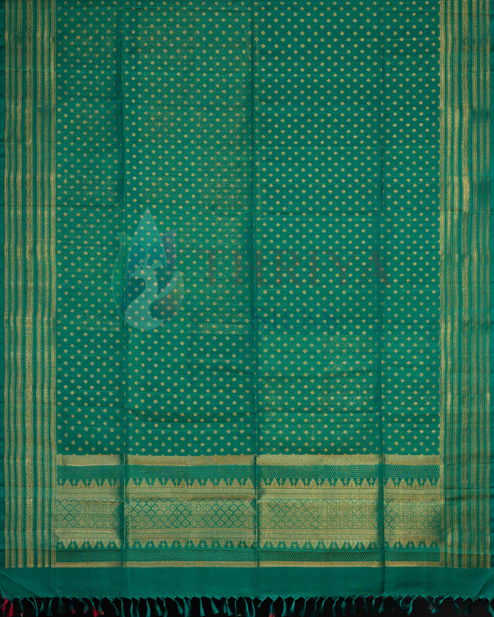 Emerald green silk dupatta with zari motifs and soft fringe edge