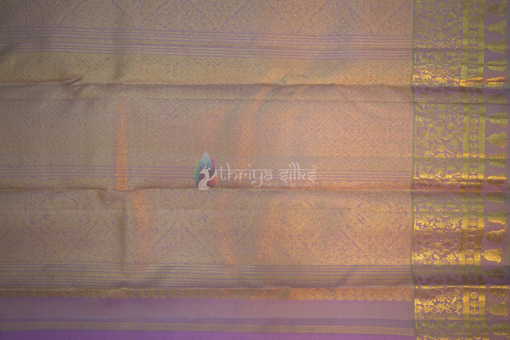 Folded lavender silk saree with diamond brocade zari work 