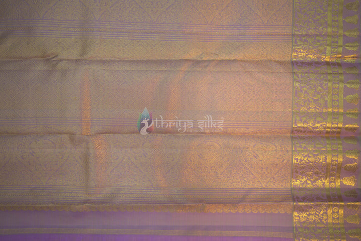 Folded lavender silk saree with diamond brocade zari work 
