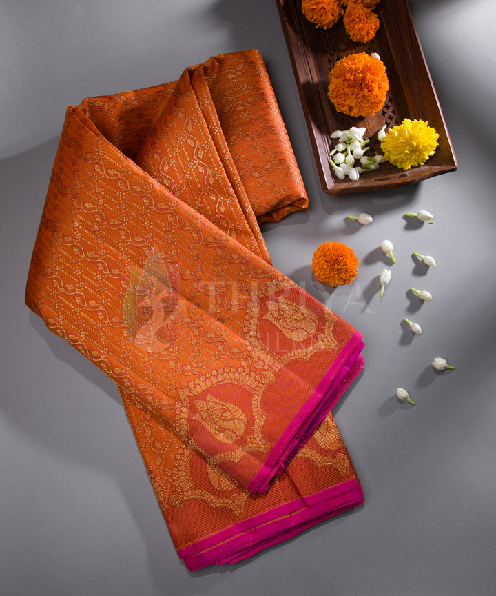 folded-orange-kanchipuram-silk-saree-pink-border