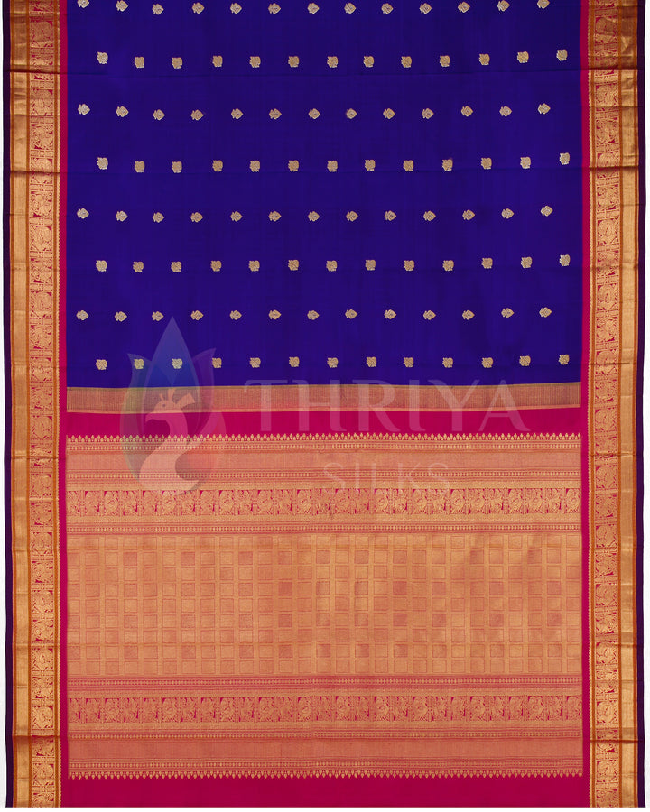 Complete view of royal blue and pink Kanjivaram silk saree with golden motifs and broad zari border – top layout by Thriya Silks
