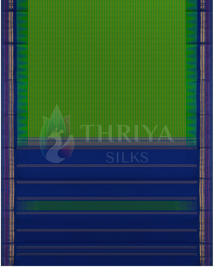 Full layout of green silk saree with blue pallu and golden border, Thriya Silks