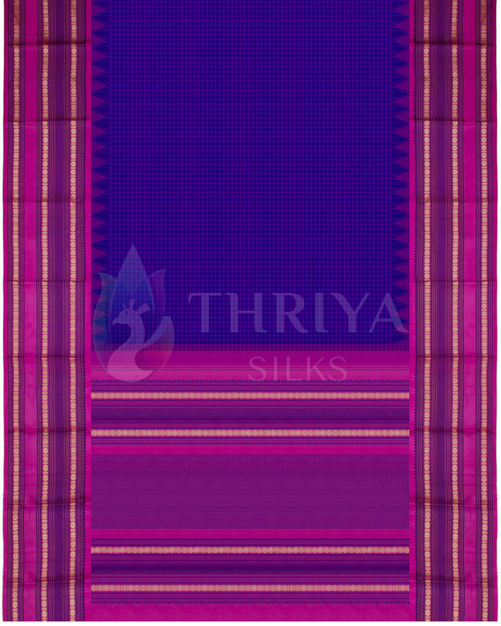 Full layout of purple silk saree with pink and gold zari border, traditional design from Thriya Silks