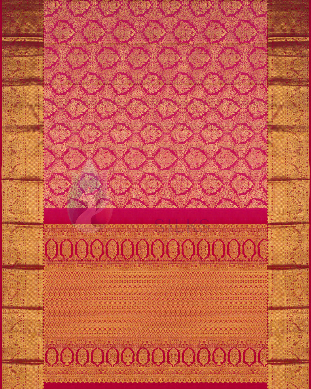 Full layout of rust Kanjivaram silk saree with gold zari border and traditional temple motifs