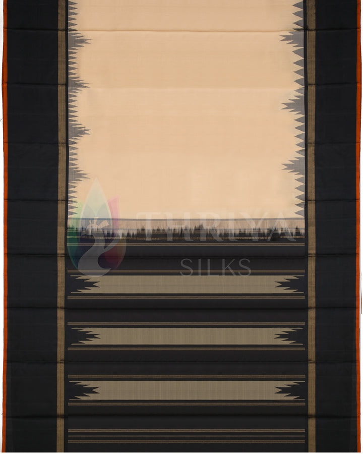 Full view of beige silk saree with contrasting black temple border and pallu