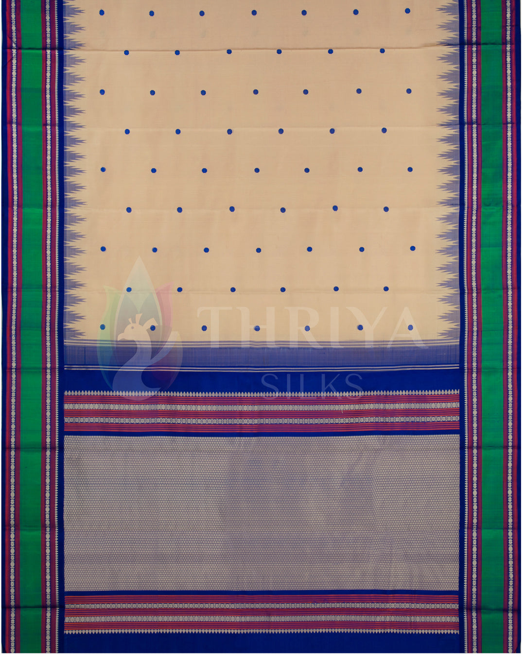 Full layout of beige silk saree with contrast green border and intricate blue pallu, Thriya Silks