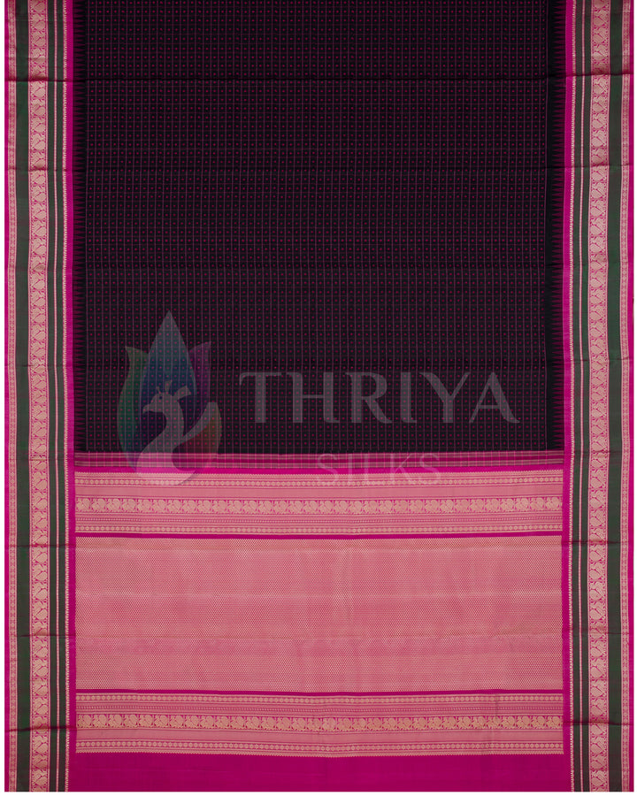 Full view of black and pink Kanjivaram silk saree with gold zari pallu and traditional weave design