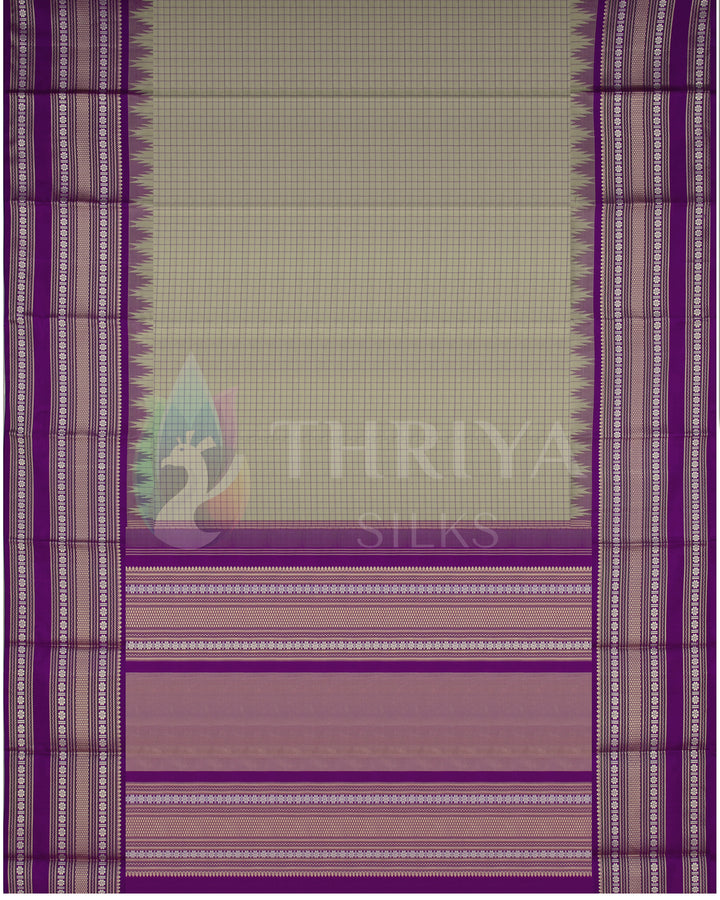 Full view of olive green and purple Kanjivaram silk saree with silver zari patterns