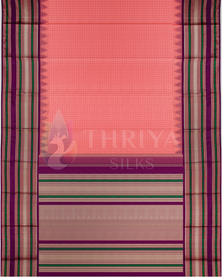Full view of peach and purple Kanjivaram silk saree with traditional weave and rich zari work