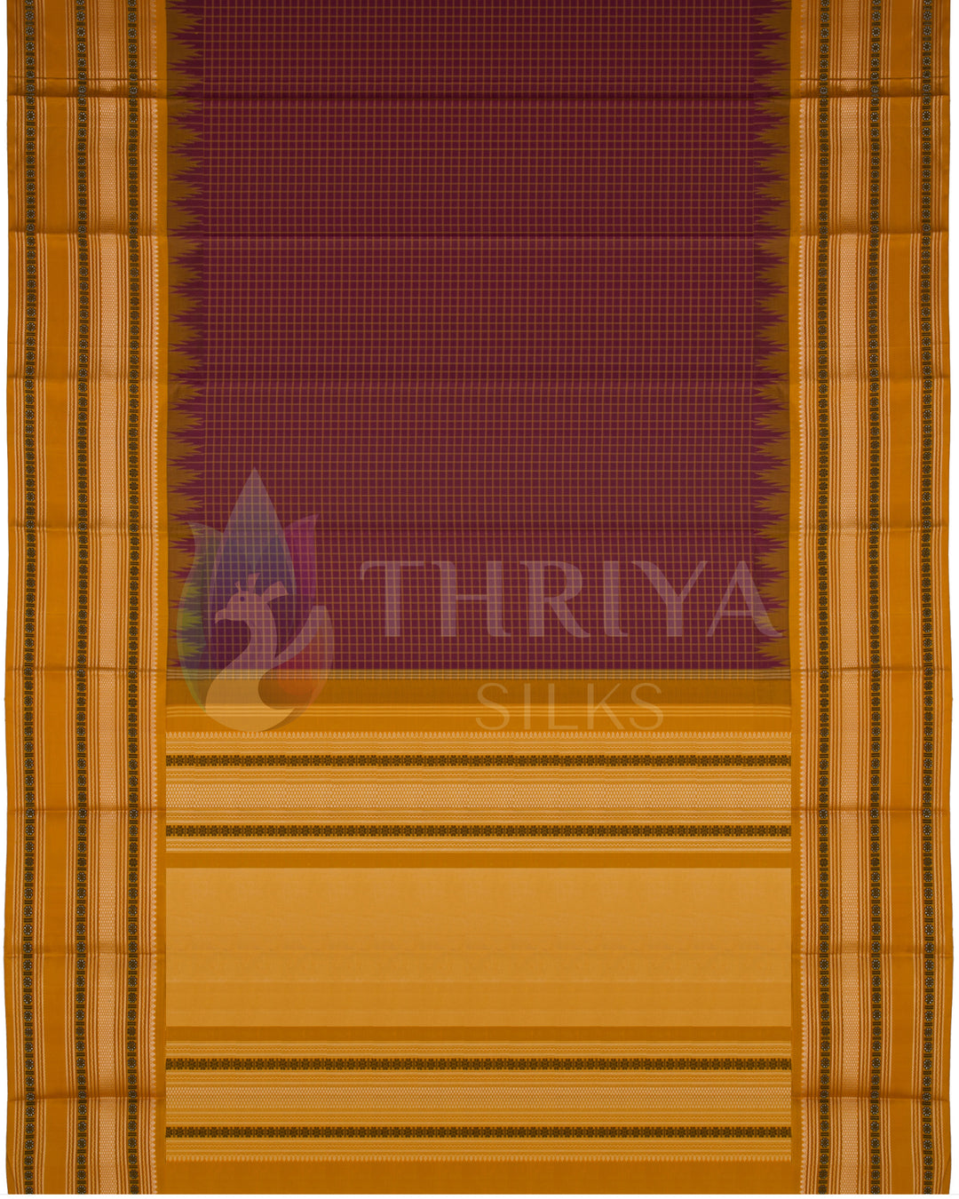Full layout of maroon and mustard yellow Kanjivaram silk saree with contrast temple border