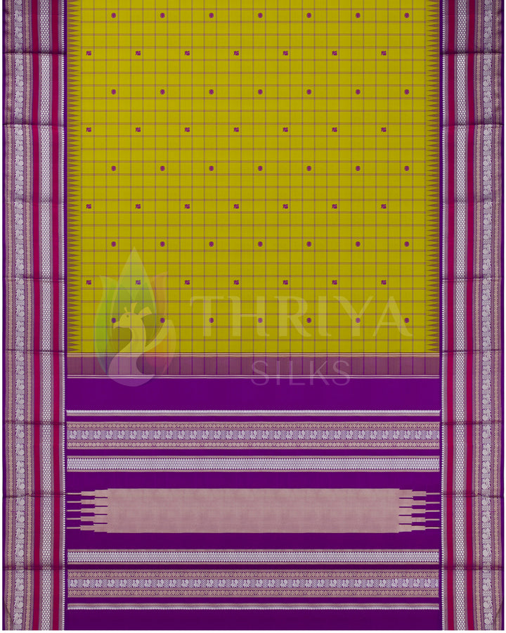 Full layout of yellow silk saree with magenta borders, checkered pattern, and detailed zari pallu, from Thriya Silks