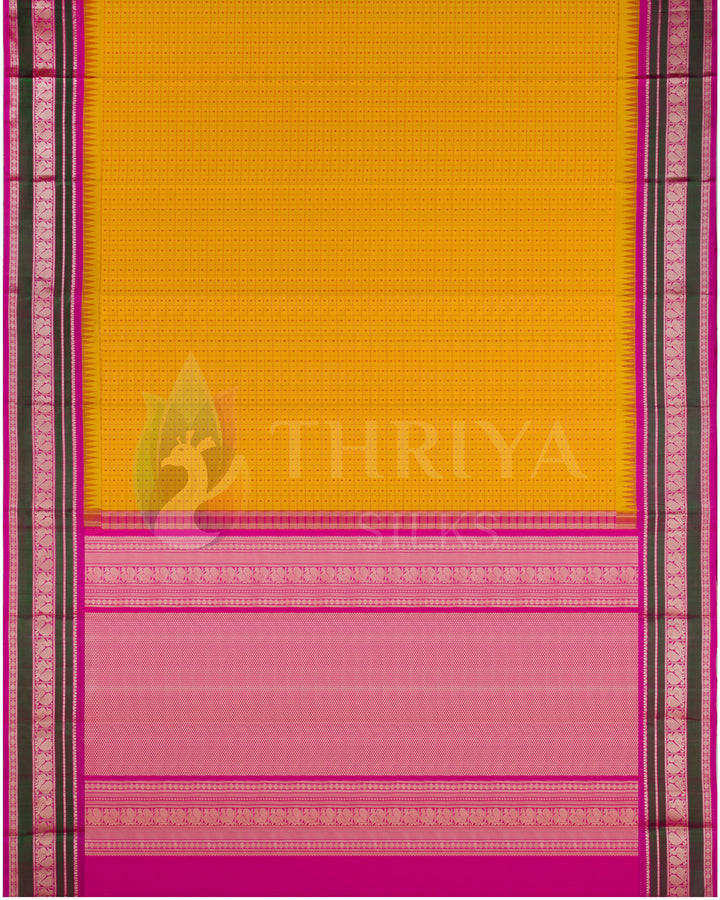 Full layout of yellow soft silk saree with pink pallu and intricate zari work