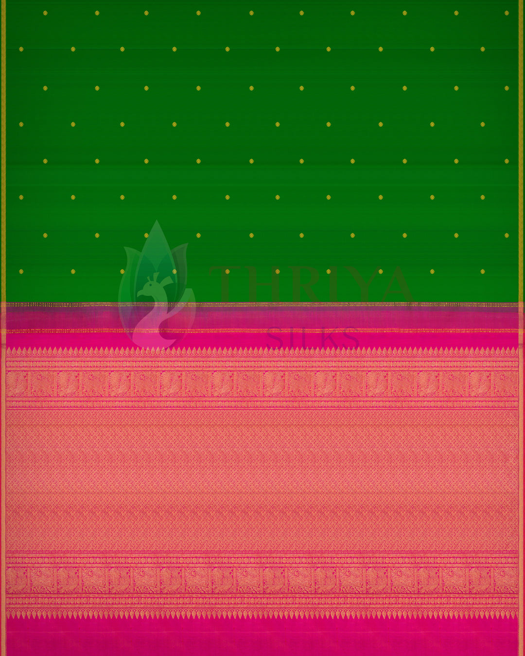 Green Kanchipuram silk saree with small gold buttas and rich pink zari pallu