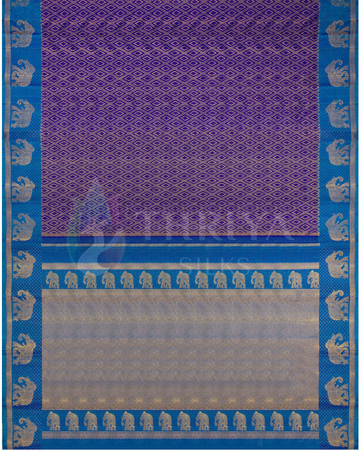 Full pallu view of purple and blue Kanjivaram silk saree with gold elephant motifs and zari weave