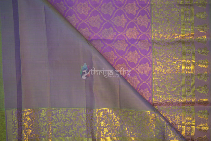 Lavender Kanchipuram silk saree fabric detail with diamond motifs and copper zari