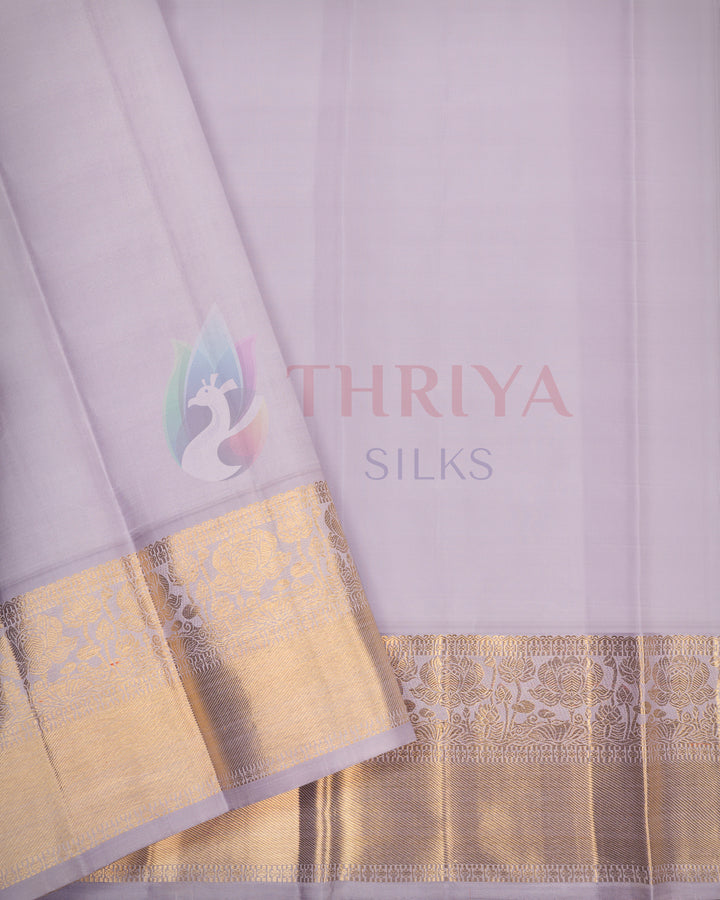 Plain lavender Kanjivaram silk saree with golden zari border – minimalist traditional saree by Thriya Silks