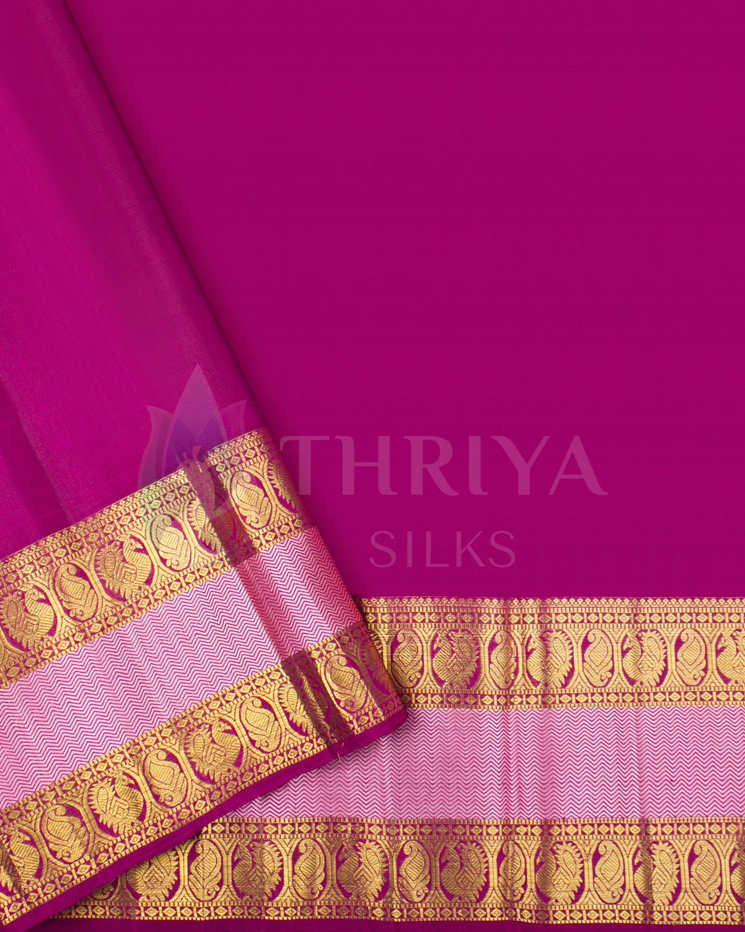 Plain magenta blouse piece with dual zari border for pairing with the pink swan motif saree