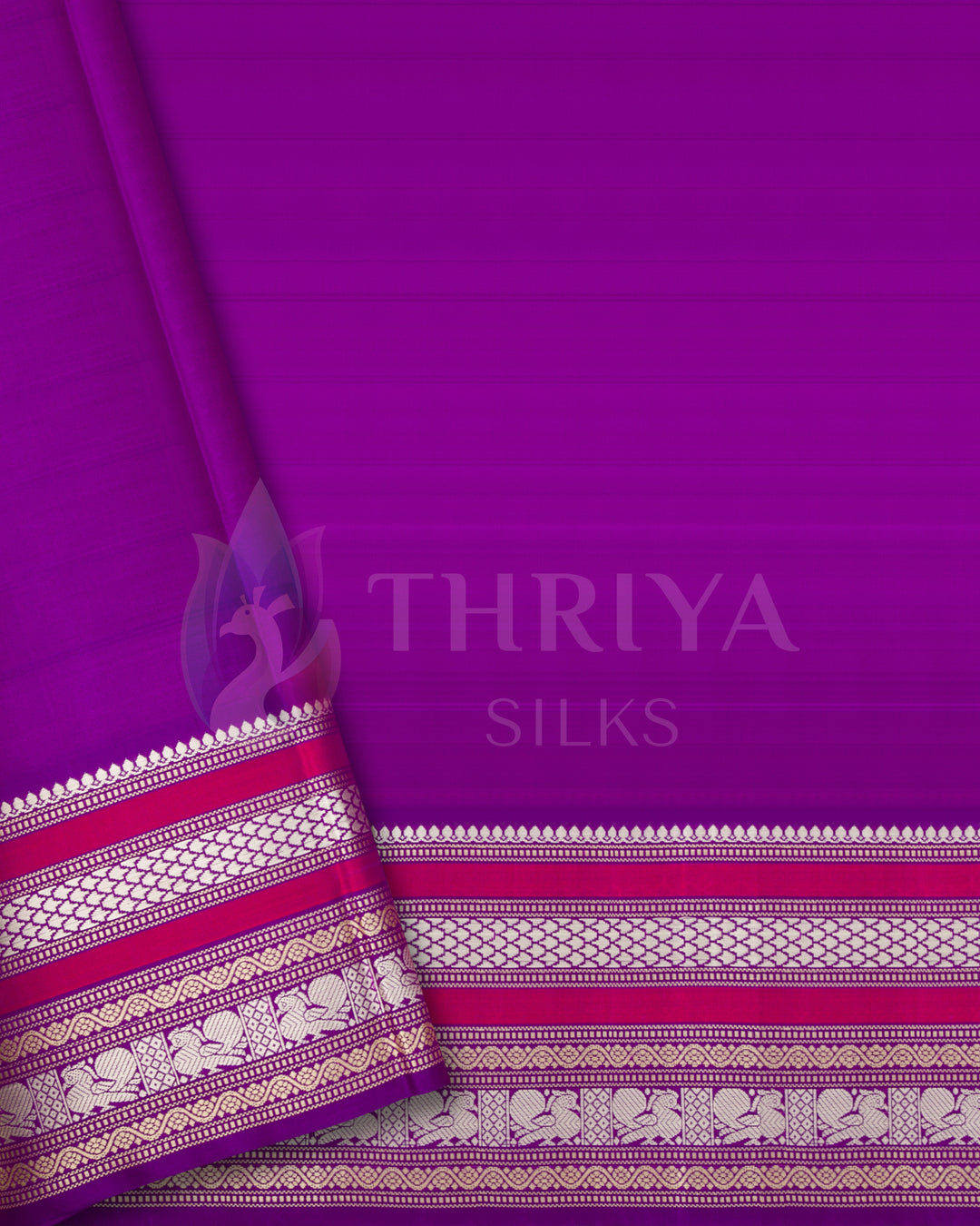 Plain magenta blouse piece with rich silver zari border matching the saree from Thriya Silks