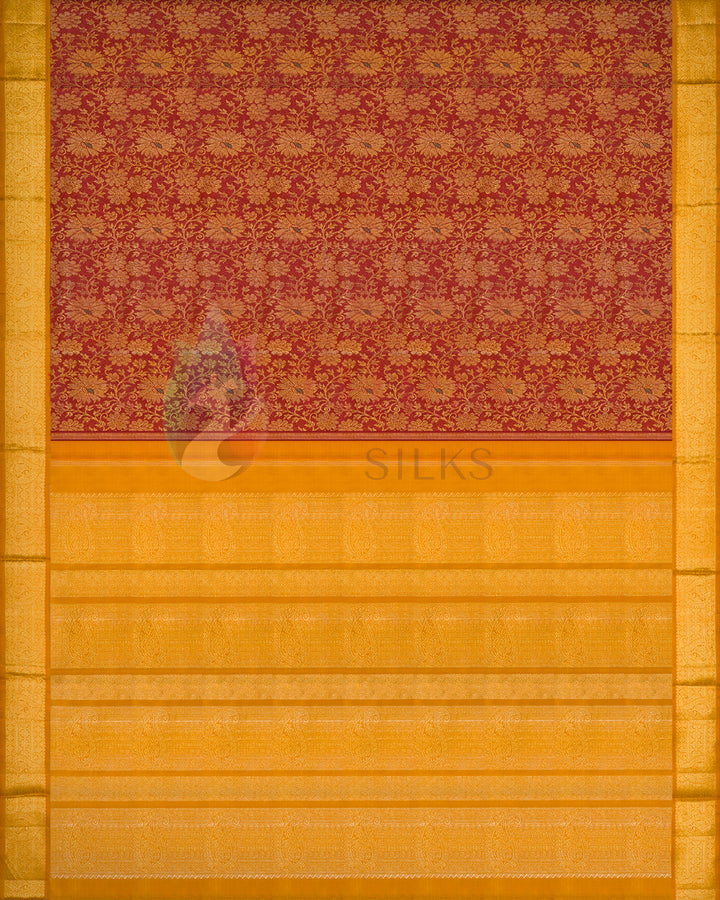 Full view of maroon Kanjivaram silk saree showcasing golden zari pallu and traditional motifs