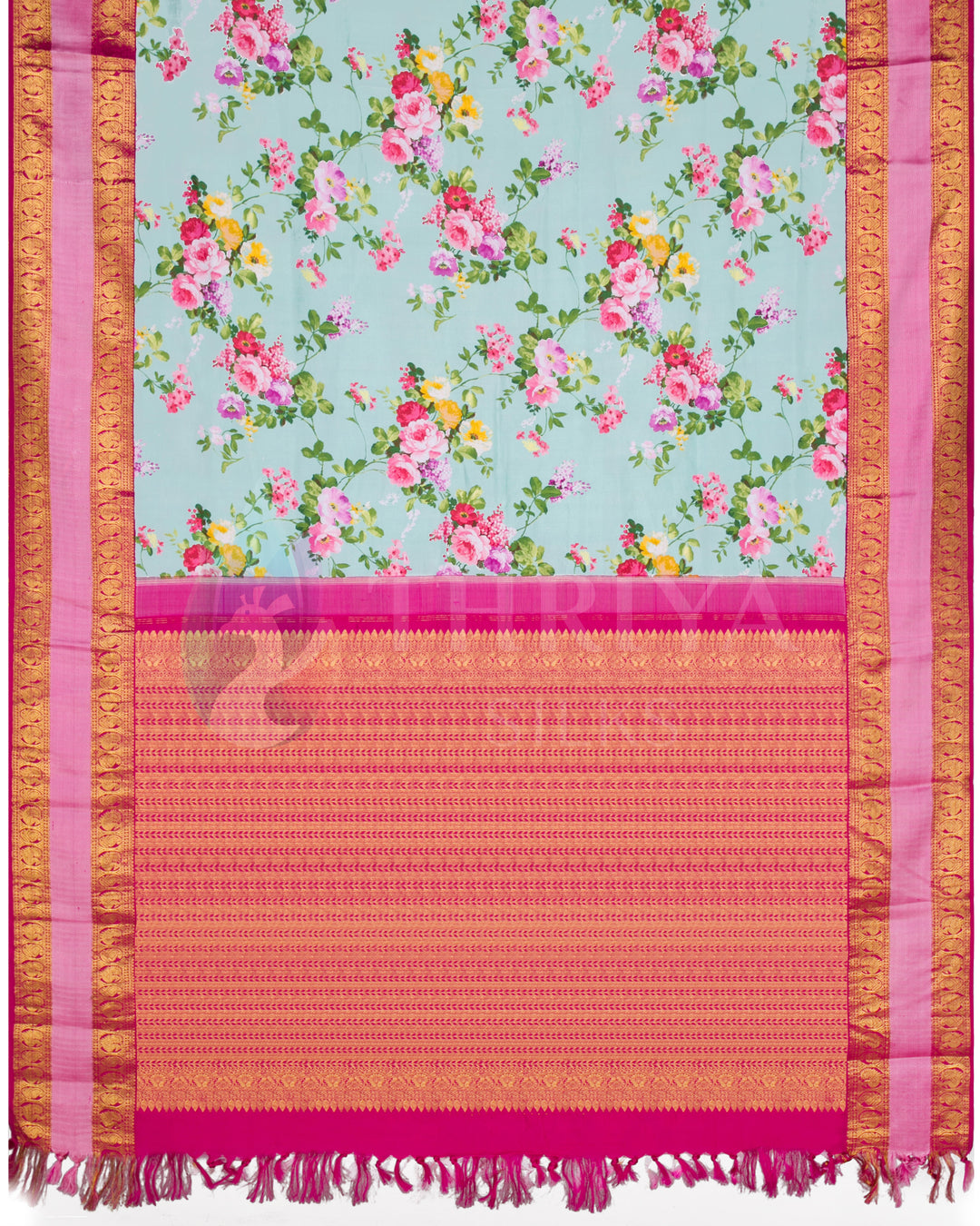 Full pallu view showing mint green body with all-over floral pattern and detailed pink zari pallu