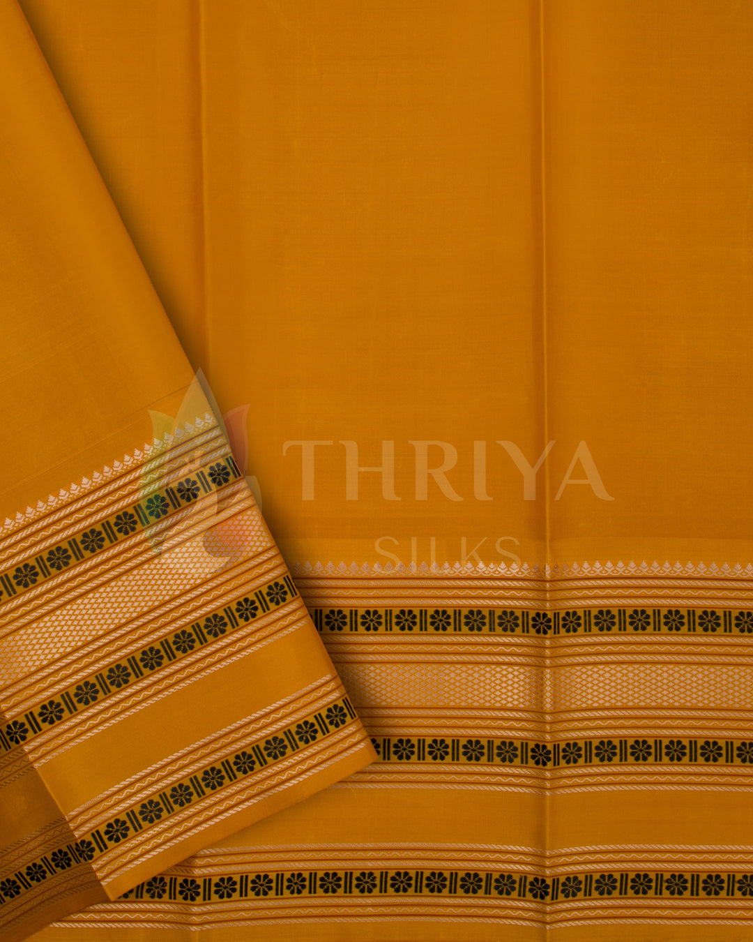Mustard yellow Kanjivaram blouse piece with elegant woven zari and floral border