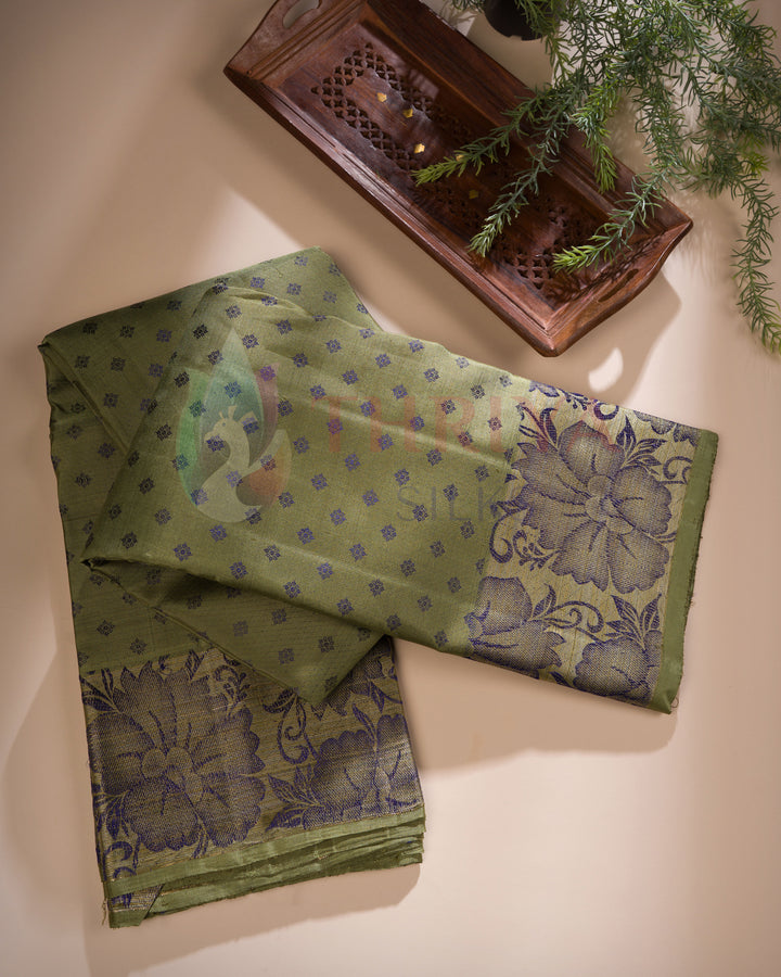 Olive green Kanchipuram silk saree with intricate purple zari motifs and floral border