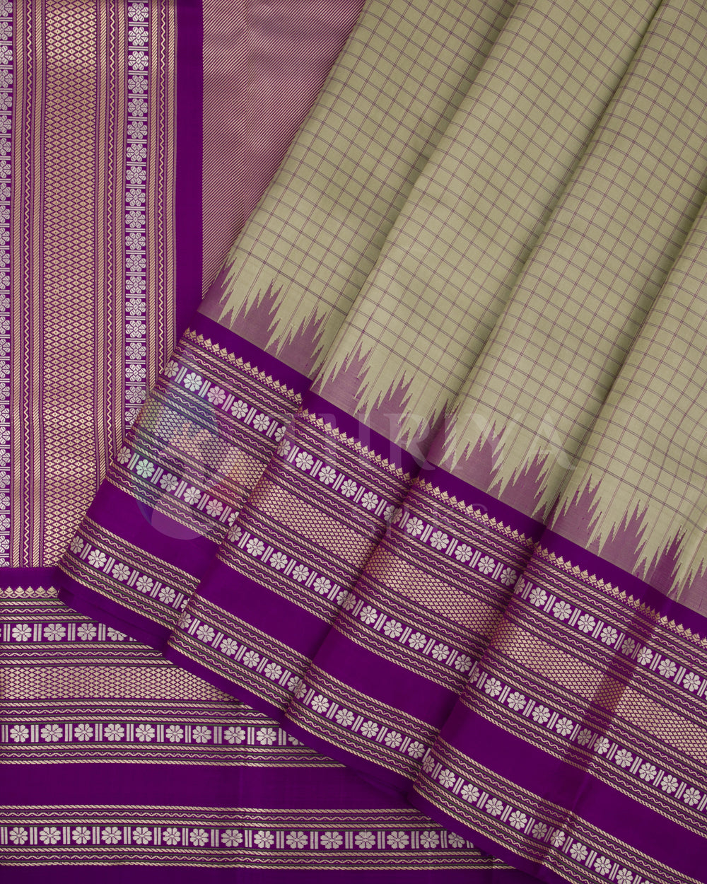 Olive green Kanjivaram silk saree with purple border and silver zari temple pallu