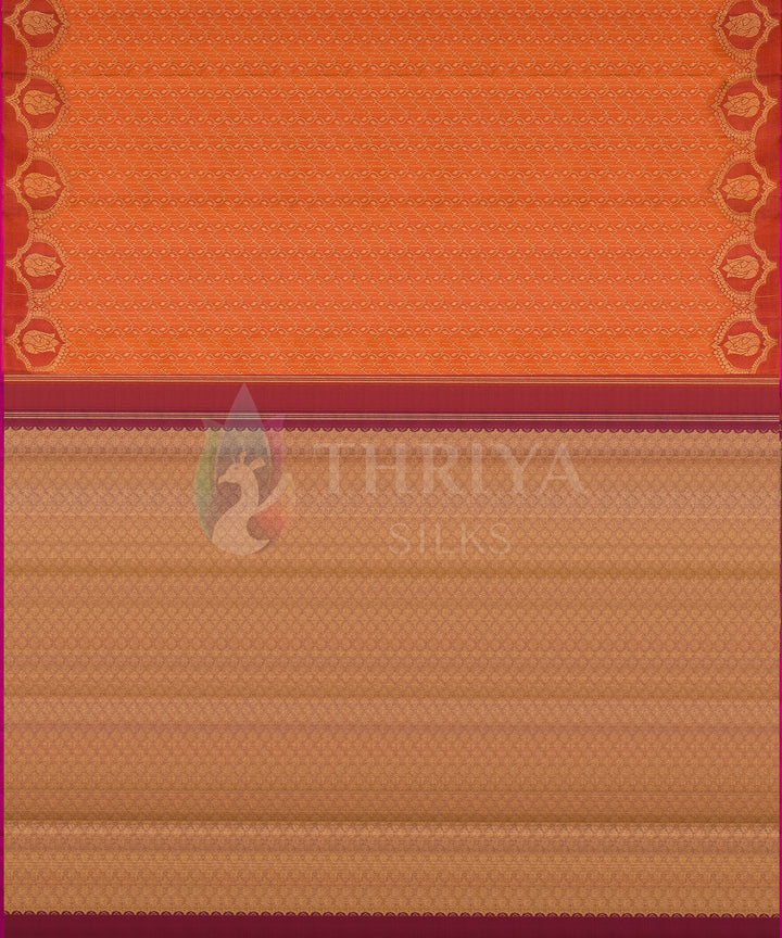 Dual tone Kanchipuram silk saree with vibrant orange body and intricate golden beige pallu bordered in maroon