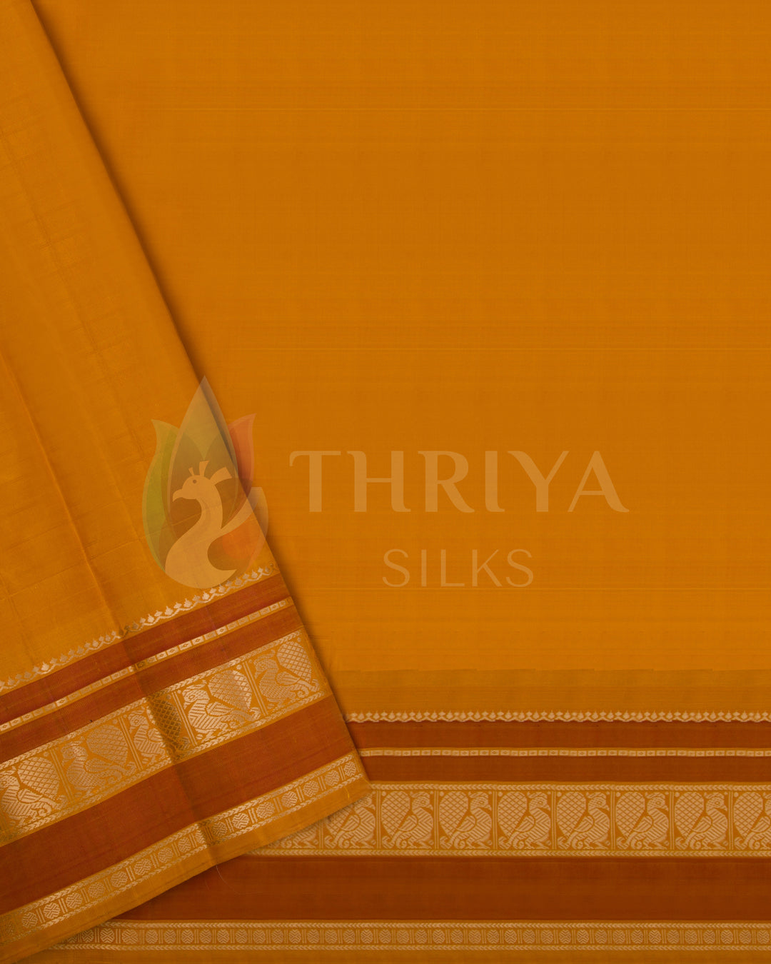 Unstitched orange blouse piece with gold zari border to match cream silk saree