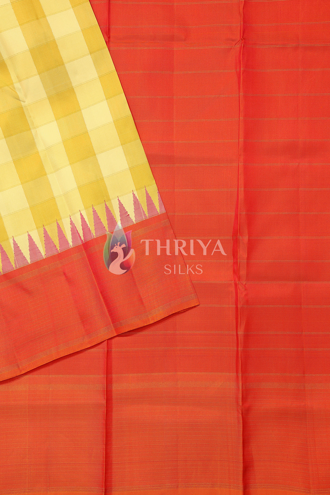  Orange silk saree with yellow checked pallu and pink temple border.