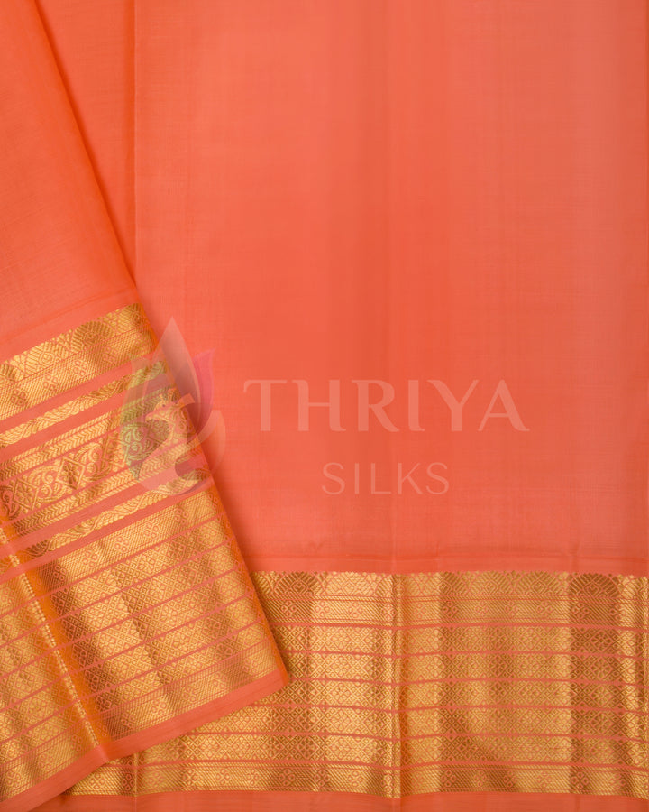 Peach Kora silk saree showcasing golden zari border and plain body