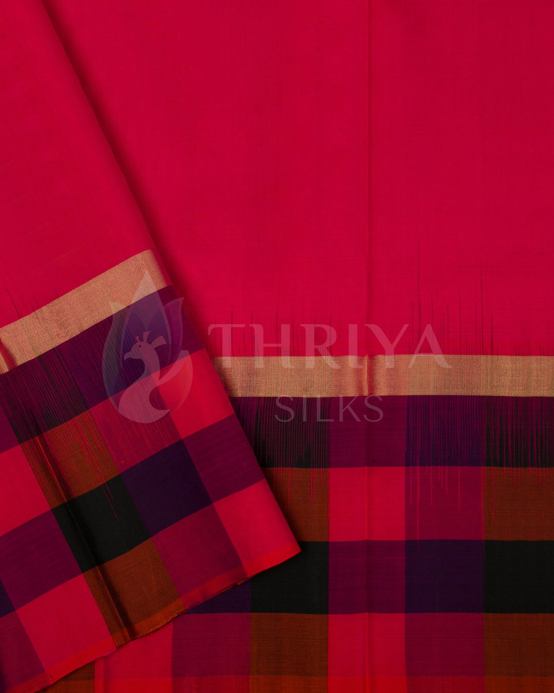 Pink blouse piece with multicolor border, complementing the Kanchipuram silk saree